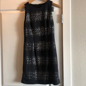 Sleeveless black dress with back zipper